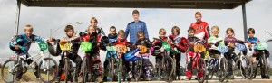 Riding crest of BMX wave