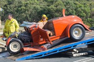 Driver injured after hot-rod hits bridge