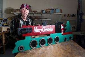 Santa descends on hills by train