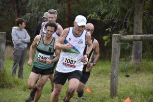 Athletes enjoy cross country mud