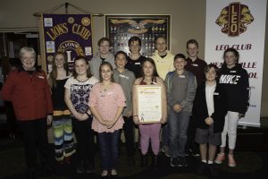 Lions dinner presents certificates