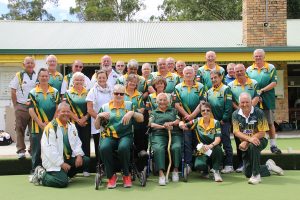 Bowlers help mates
