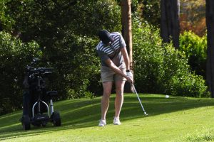 Golfers thrive in heavy conditions