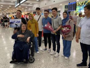 Zaki reunites with family