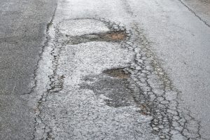 Pothole a pain in the neck