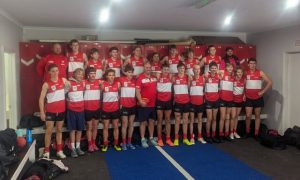 Healesville celebrate past players against old rivals Woori Yallock.