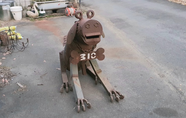Iconic dog letterbox is finally back home